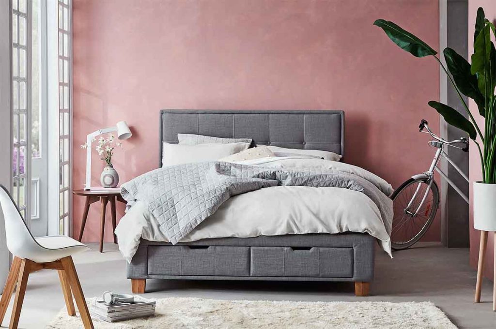 The 'Aura Chambray' Quilted Quilt Cover in Dove pictured with the 'Aura Maison Fringe' Quilt Cover in White.